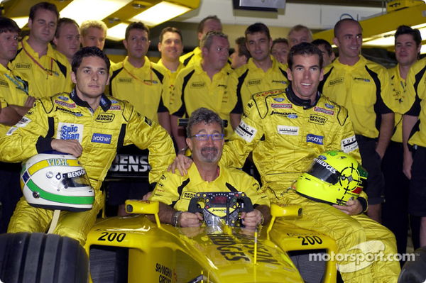 f1-brazilian-gp-2003-eddie-jordan-giancarlo-fisichella-ralph-firman-and-the-team-celebrate