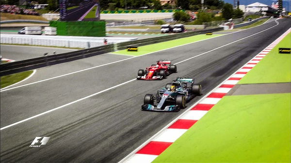 2017-F1-Spanish-Grand-prix-Ferrari-Mercedes-Hamilton-passing-Vettel