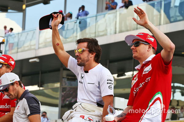 f1-abu-dhabi-gp-2016-fernando-alonso-mclaren-with-kimi-raikkonen-ferrari-on-the-drivers-pa