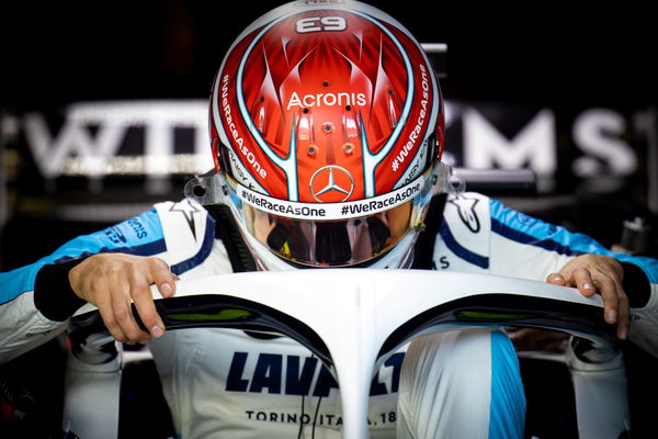 Russell wearing his helmet with attached visors to it