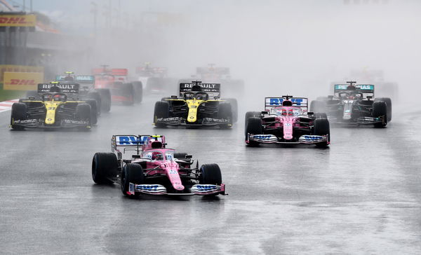 F1 drivers in their respective cockpits