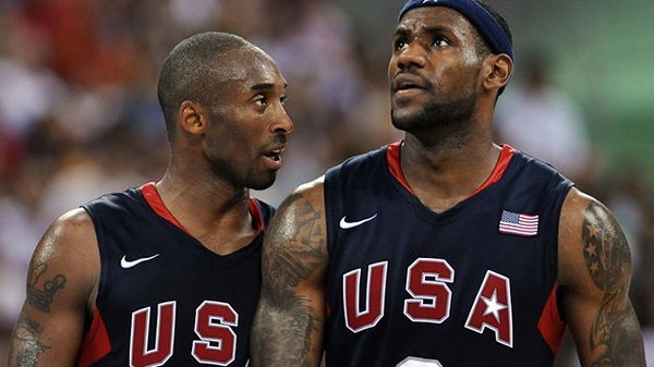 USA&#8217;s Kobe Bryant (L) looks at USA&#8217;s LeB