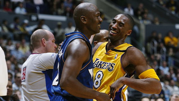 Kobe Bryant shares a laugh with Michael Jordan