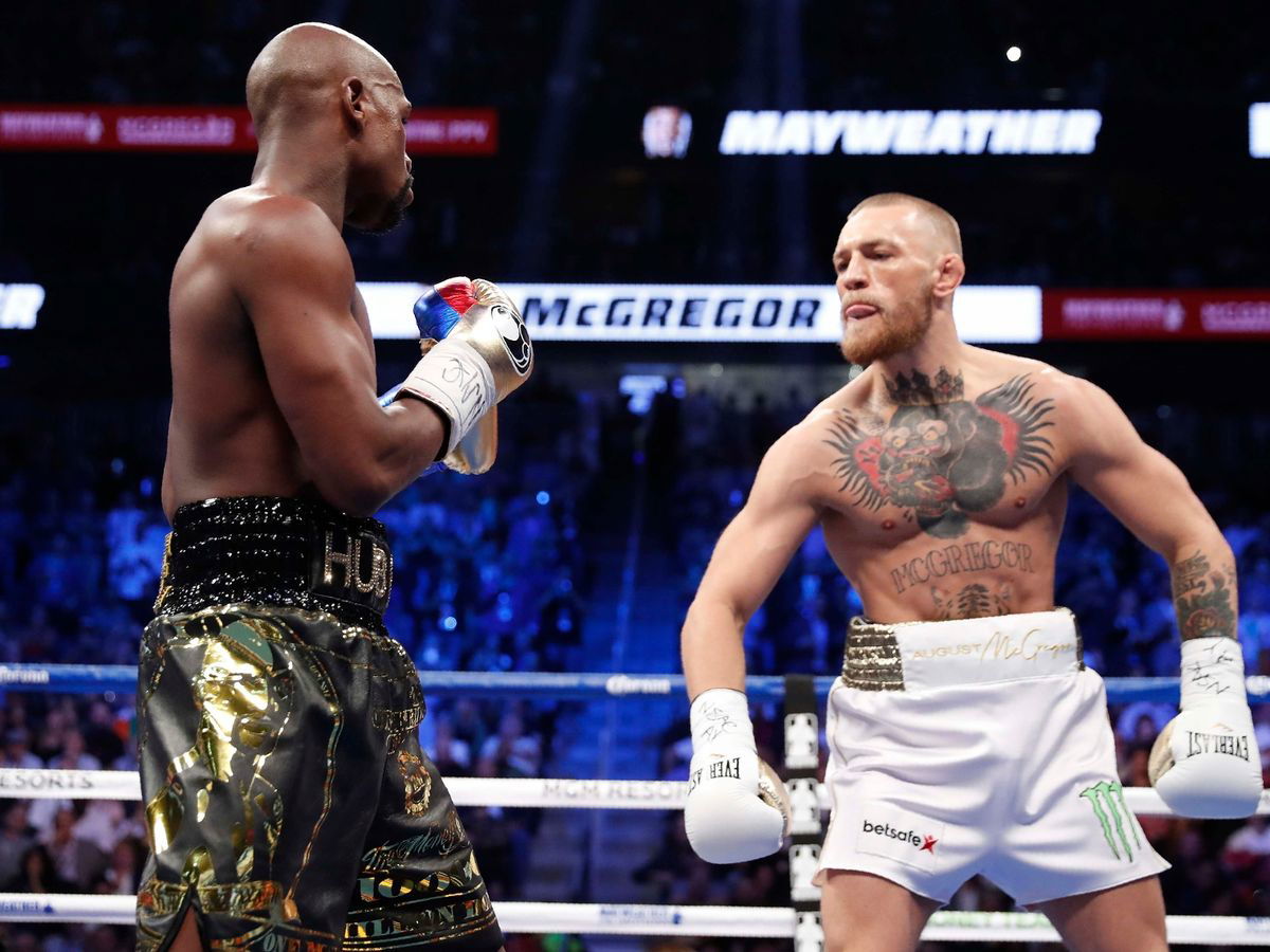 Conor McGregor in war of words with Draymond Green after wearing Golden  State Warriors jersey to mock Floyd Mayweather