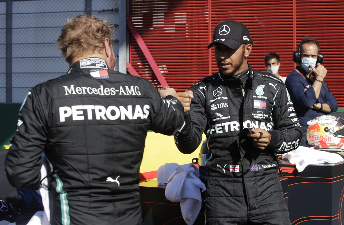 F1 - Mercedes drivers lewis Hamilton and Valtteri Bottas congratulate each other after a 1-2 finish