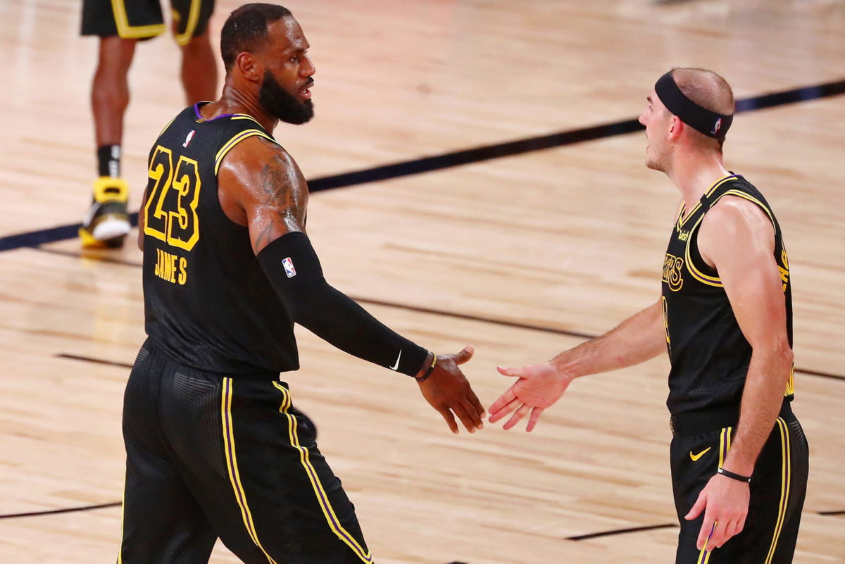 Los Angeles Lakers Star LeBron James celebrating with Alex Caruso