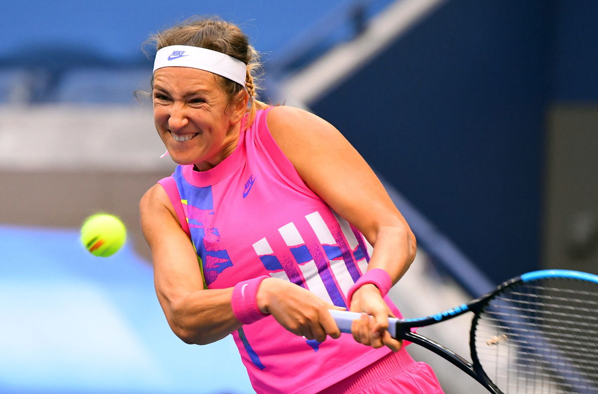 Victoria Azarenka hits a backhand