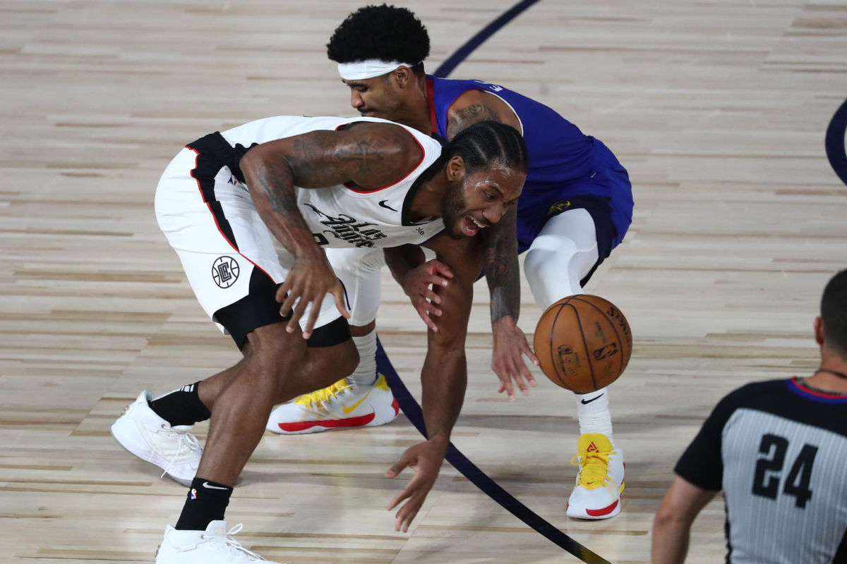 LA Clippers' Kawhi Leonard against Nuggets Gary Harris