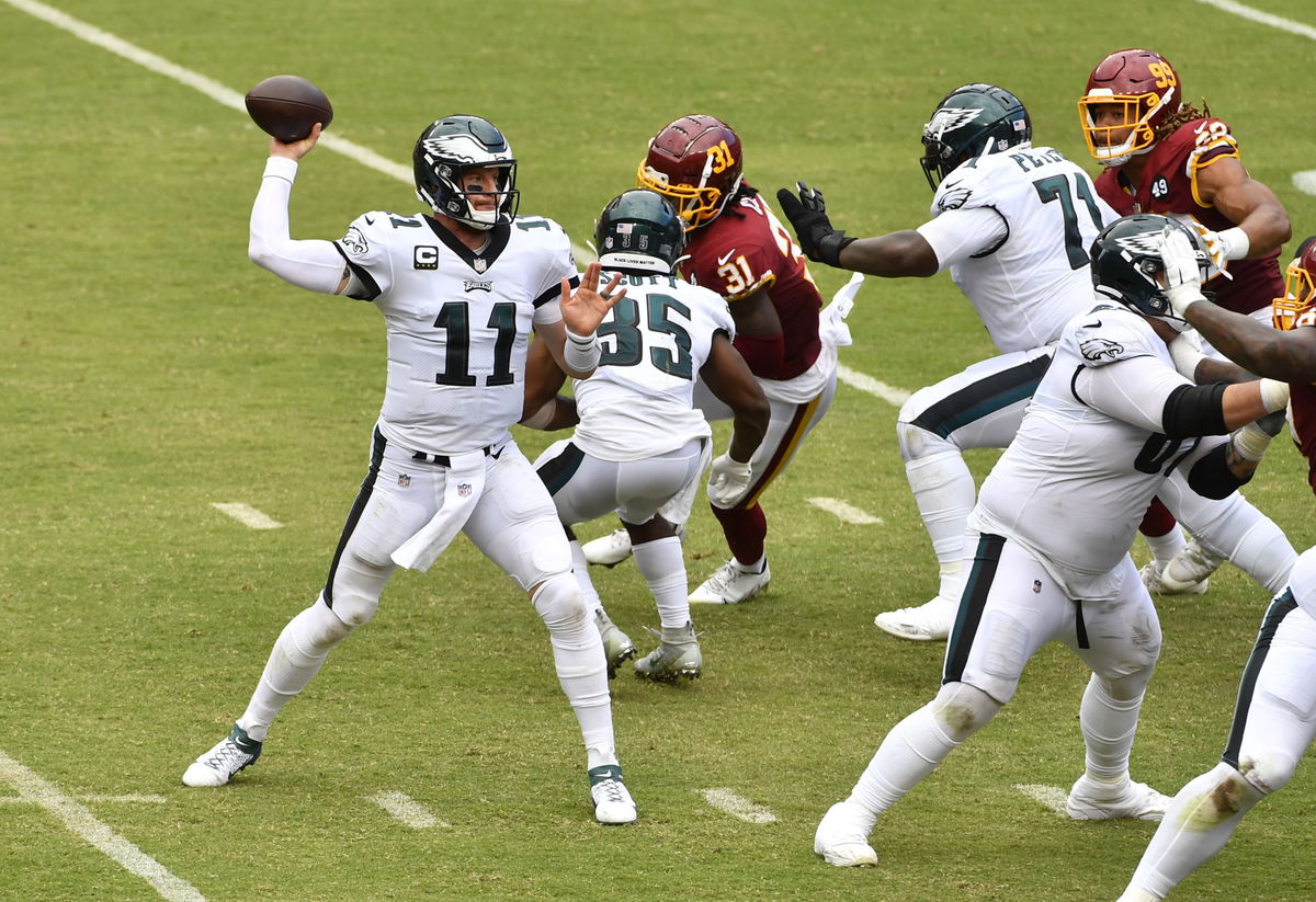 Carson Wentz attempts a pass against the Washington Football Team in Week One.