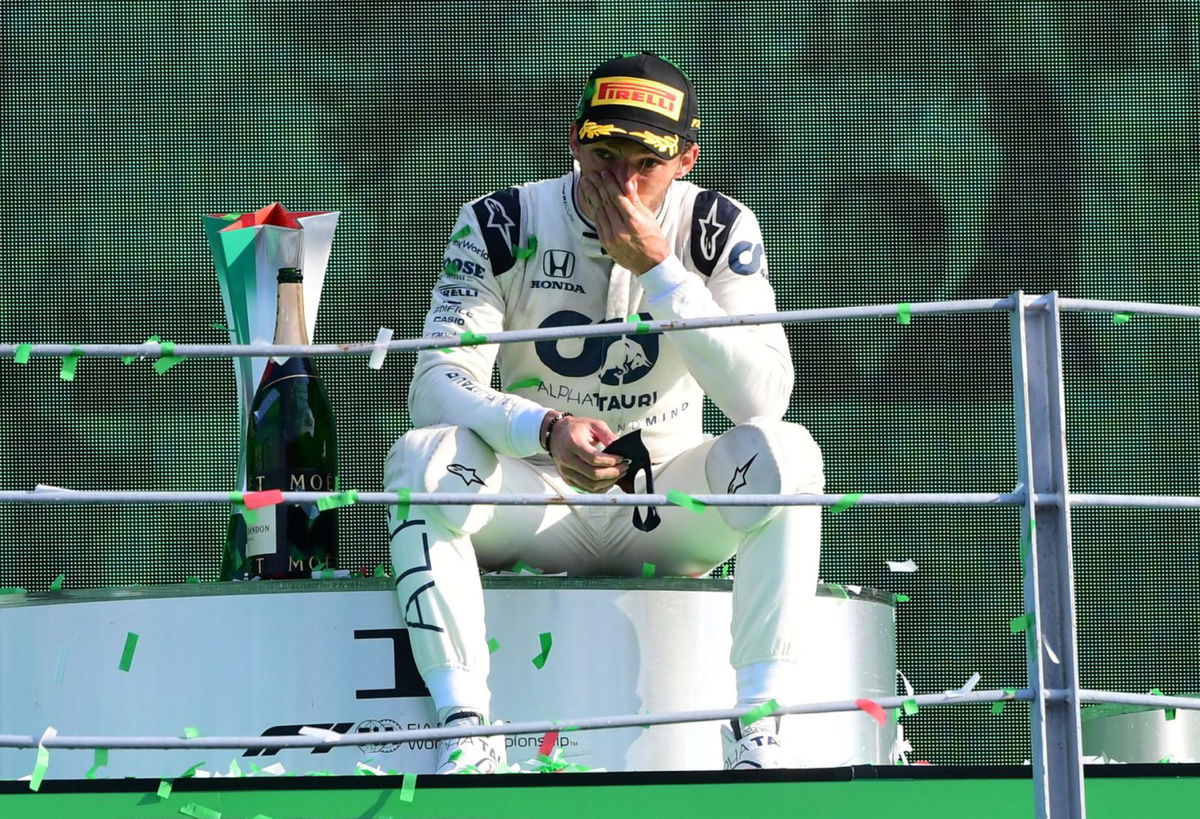 AlphaTauri driver Pierre Gasly soaks in the moment, sitting atop the podium following his maiden win at the Italian Grand Prix