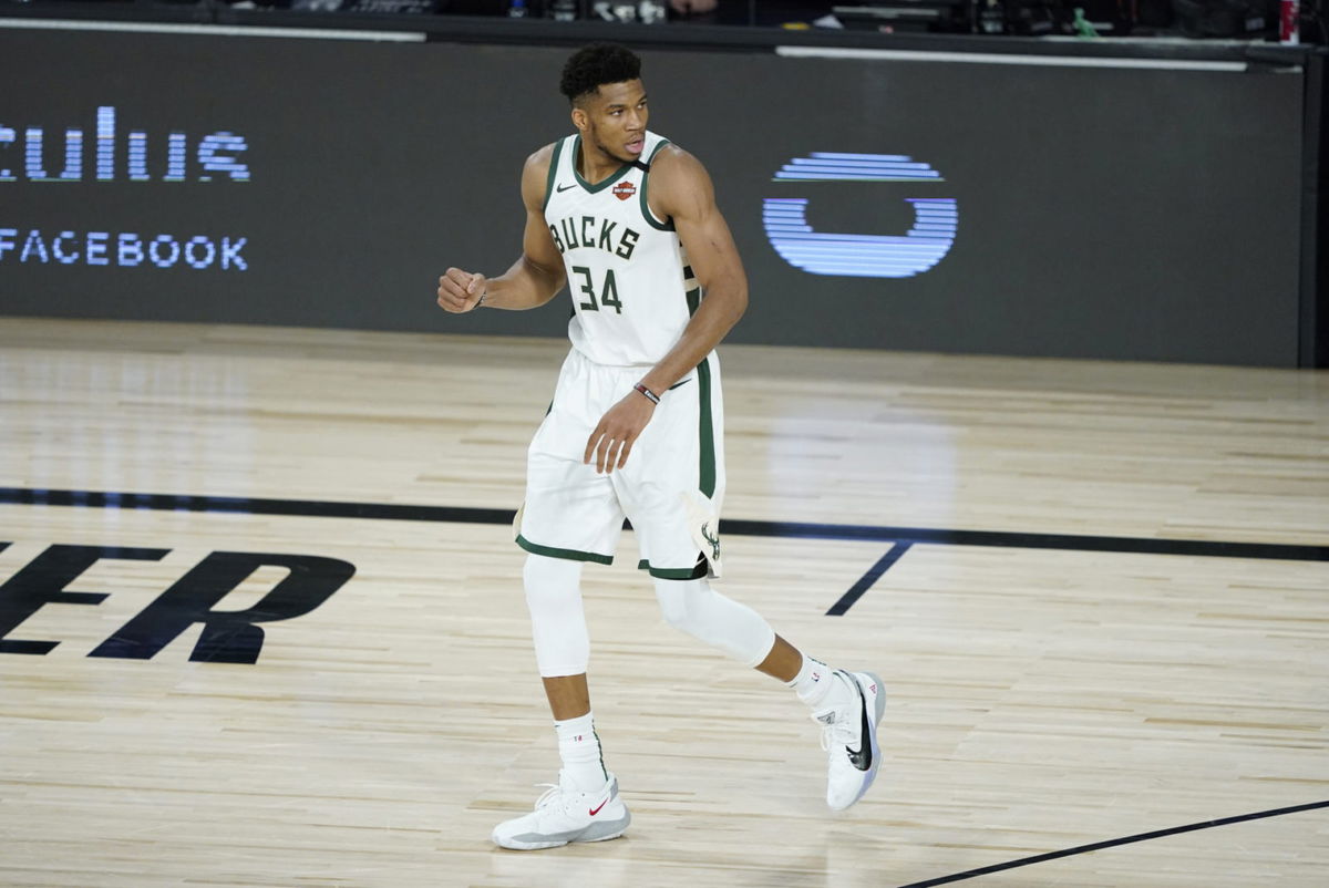 Milwaukee Bucks forward Giannis Antetokoumpo celebrates during a moment in Game 2 against the Orlando Magic in the 2020 NBA Playoffs