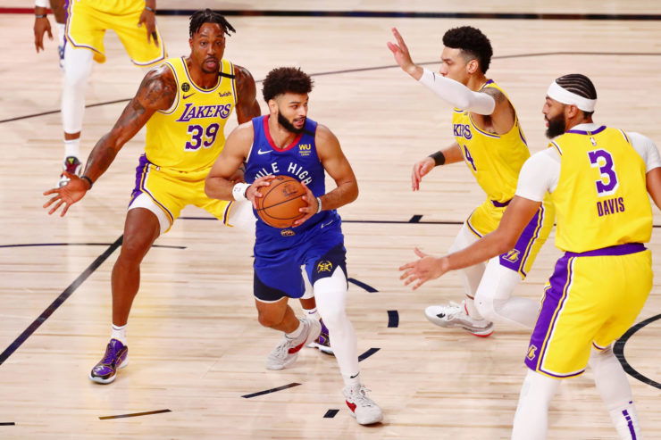 Los Angeles Lakers defending Denver Nuggets star Jamal Murray