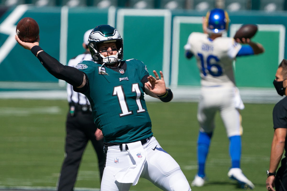 Philadelphia Eagles quarterback Carson Wentz (11) passes the ball against the Los Angeles Rams on Sunday.