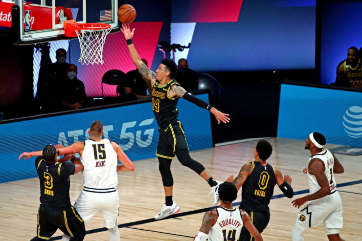 Los Angeles Lakers guard Danny Green shoots the ball against Denver Nuggets center