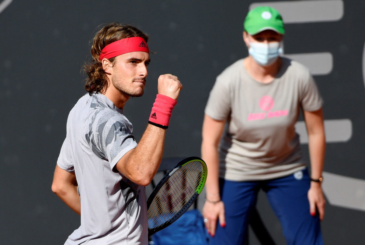 Stefanos Tsitsipas celebrates after winning a point in the German Open