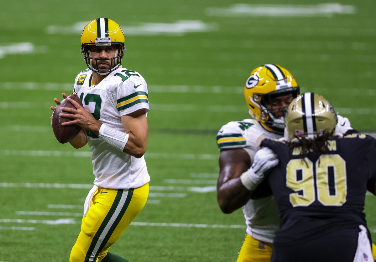 Green Bay Packers quarterback Aaron Rodgers attempts to make a pass against New Orleans Saints in Week Three.