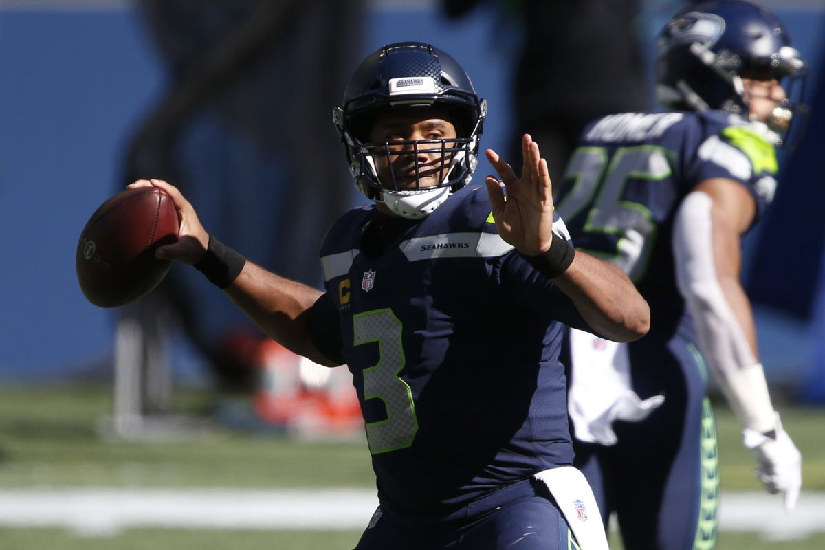 Seattle Seahawks quarterback Russell Wilson attempts a pass against Dallas Cowboys in Week Three.