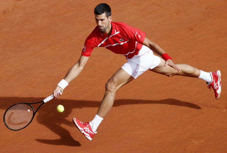 Novak Djokovic plays a forehand at French Open 2020