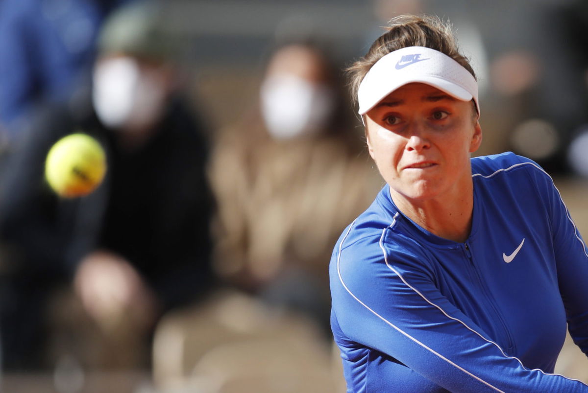 Elina Svitolina hits a backhand