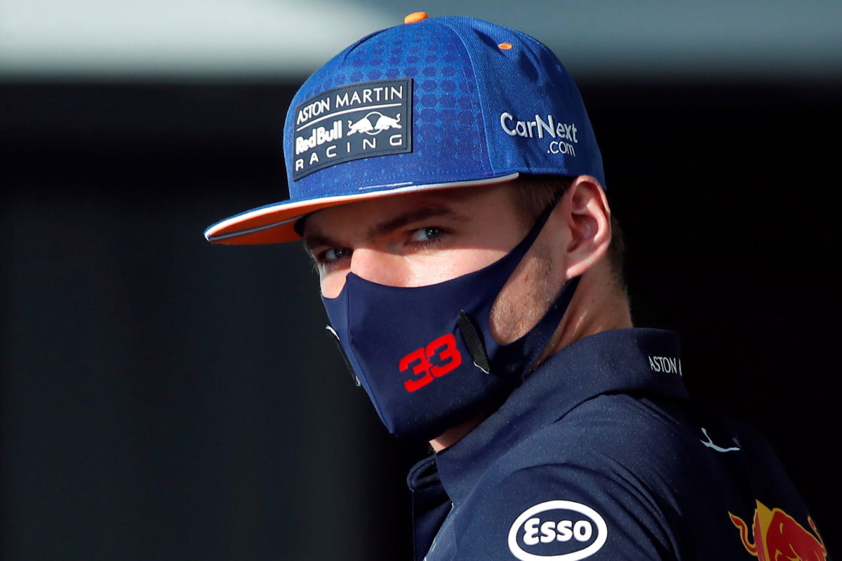 Red Bull driver Max Verstappen looks on in the paddock prior to the Russian Grand Prix