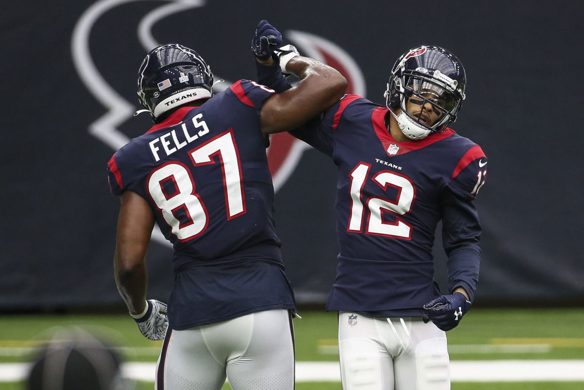 Houston Texans wide receiver Kenny Stills celebrates with tight end Darren Fells against Minnesota Vikings.
