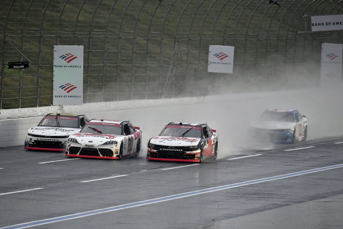 Drivers race in the rain during the NASCAR Xfinity Series race at Charlotte Roval