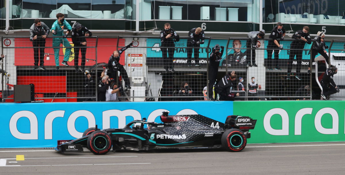 Lewis Hamilton of Mercedes crosses the finish line in P1 at the Eifel GP