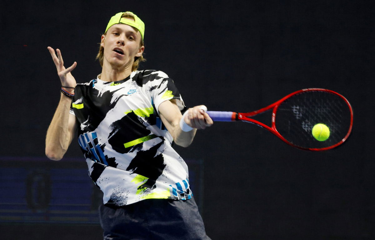 Denis Shapovalov in action against Stan Wawrinka