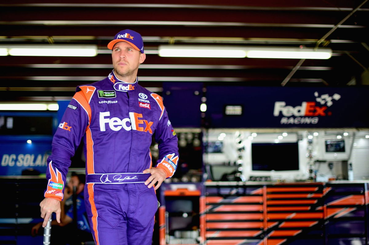 Denny Hamlin looks on