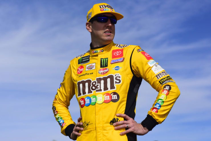 Kyle Busch looks on prior to the Hollywood Casino 400 race in Kansas