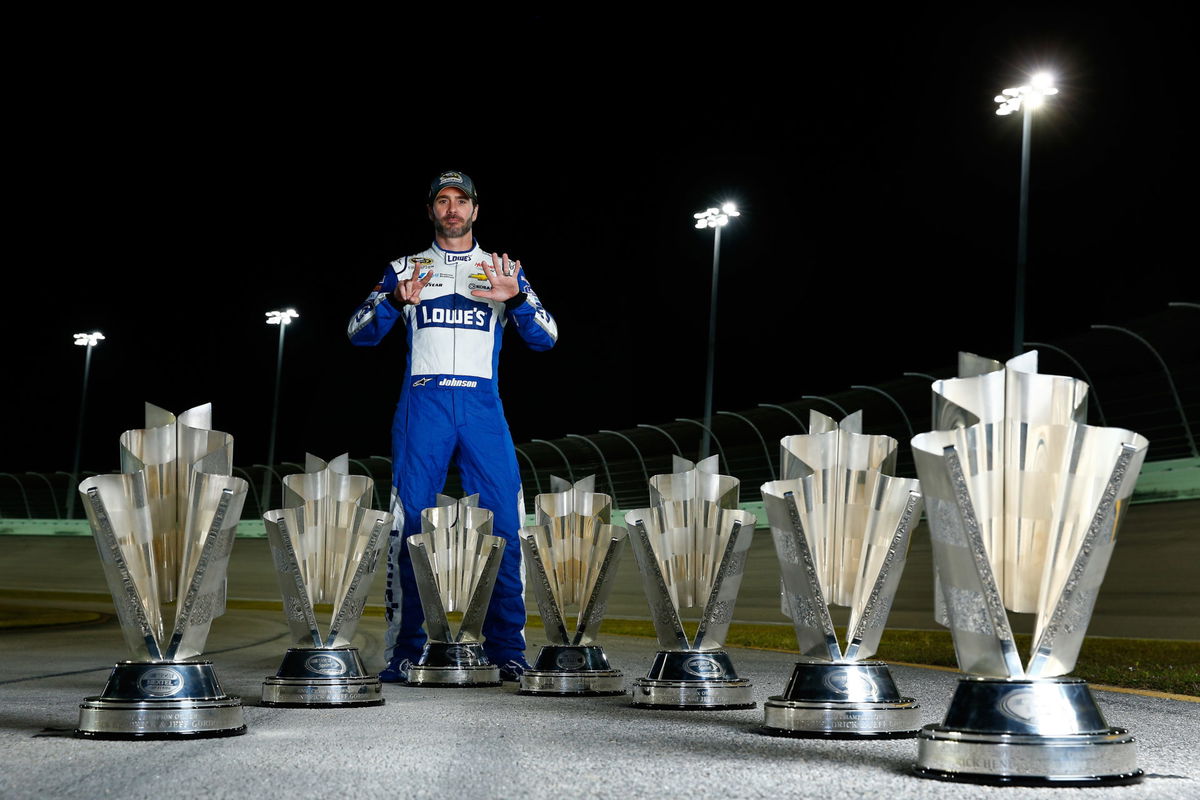 Jimmie Johnson with his NASCAR Cup Seriestrophies collection