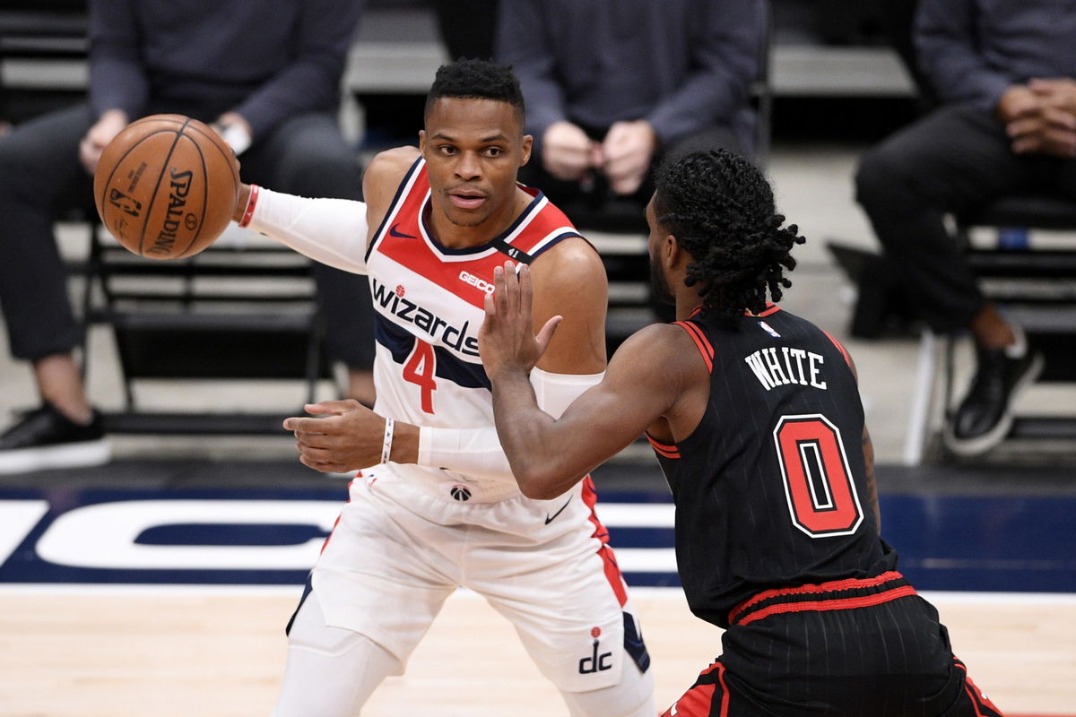 Russell Westbrook guarded by Coby White