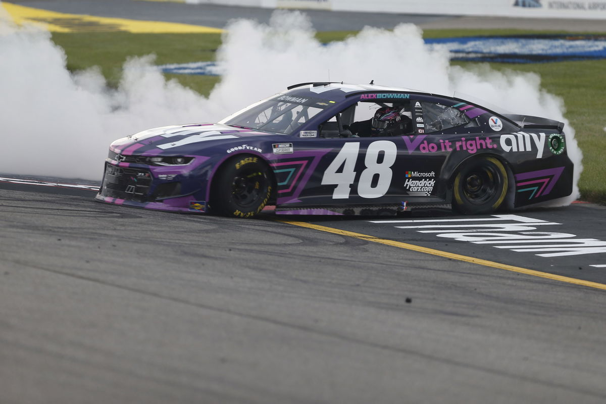 Alex Bowman celebrates in the NASCAR Cup Series