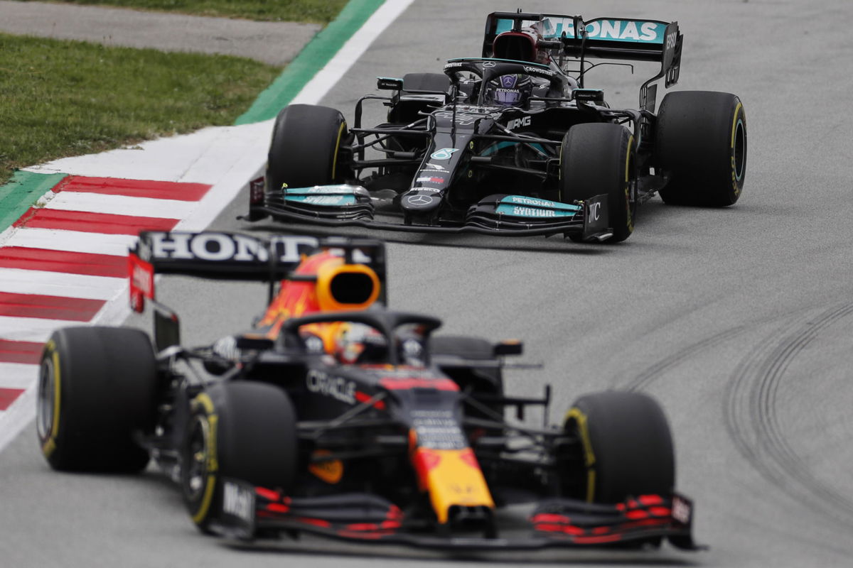 Red Bull's Max Verstappen chased by Mercedes driver Lewis Hamilton of Mercedes