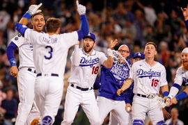 The Los Angeles Dodgers celebrate a victory over the St. Louis Cardinals