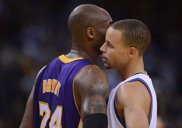 Golden State Warriors&#8217; Stephen Curry (30) shares words with Los Angeles Lakers&#8217; Kobe Bryant (24) at the end of the game at Oracle Arena in Oakland, Calif. on Saturday, Dec. 22, 2012. Los Angeles defeated Golden State 118-115 in overtime. (Jose Carlos Faja