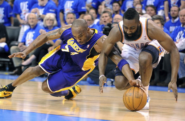 OKLAHOMA CITY, OKLAHOMA MAY 14, 2012-Lakers Kobe Bryant and Thunders James Harden battle for a loose