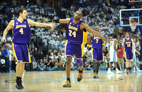 Lakers Kobe Bryant comes in for a landing as he celebrates his basket late in the 4th qaurter again