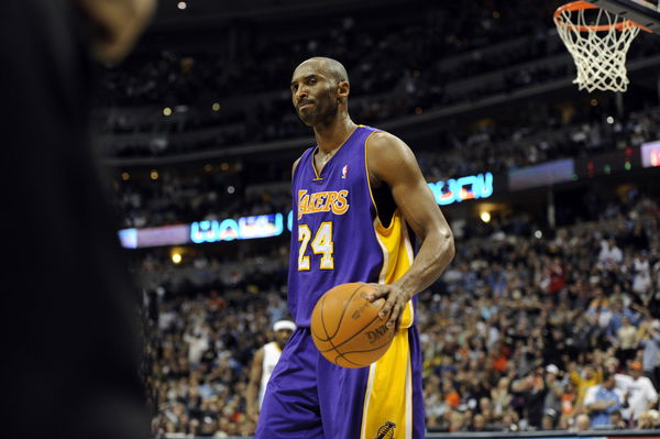 Los Angeles Lakers shooting guard Kobe Bryant (24) reacts to allowing a layup by Denver Nuggets forward Danilo Gallinari (8) during the second half of the Nuggets&#8217; 99-90 win at the Pepsi Center on Sunday, January 1, 2012. AAron Ontiveroz, The Denver Post