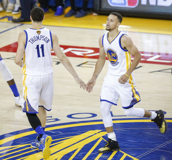 Golden State Warriors&#8217; Stephen Curry and Klay Thompson celebrate after a Curry score in the third quarter during Game 7 of the NBA Finals at Oracle Arena on Sunday, June 19, 2016 in Oakland, Calif.