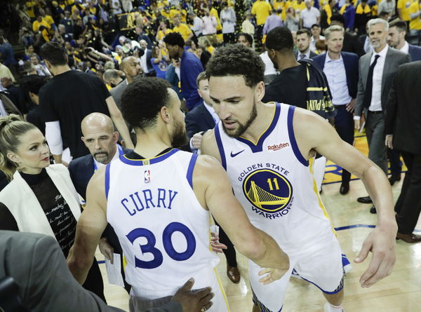 Golden State Warriors Stephen Curry and Klay Thompson embrace after the Warriors? 104 to 99 victory over the Houston Rockets in game 5 of the Western Conference Semifinals between the Golden State Warriors and the Houston Rockets at Oracle Arena on Wedne