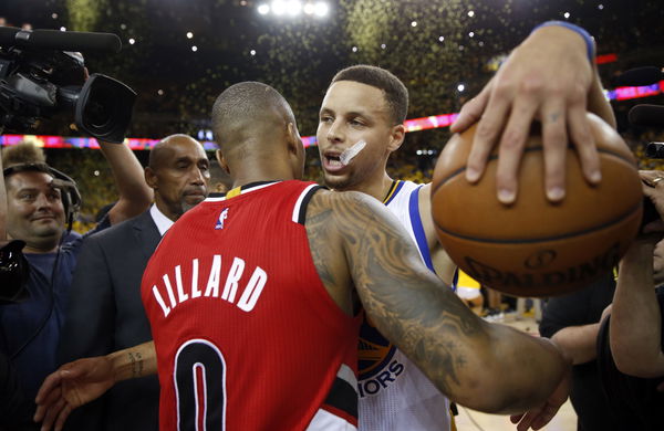 Golden State Warriors&#8217; Stephen Curry is congratulated by Portland Trail Blazers&#8217; Damian Lillard after Warriors&#8217; 125-121 win in Game 5 of NBA Playoffs&#8217; Western Conference Semifinals at Oracle Arena in Oakland, Calif., on Wednesday, May 11, 2016.