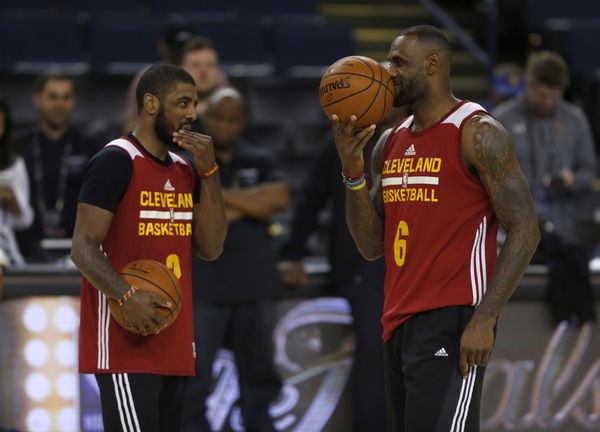 Cleveland Cavaliers&#8217; LeBron James (6) talks with Cleveland Cavaliers&#8217; Kyrie Irving (2) during media day the day before Game 1 of the NBA Finals at Oracle Arena in Oakland, Calif., on Wednesday, June 1, 2016. (Nhat V. Meyer/Bay Area News Group)