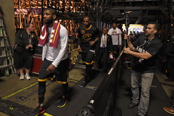 Cleveland Cavaliers&#8217; Kyrie Irving (2) and Cleveland Cavaliers&#8217; LeBron James (23) return to the locker room after defeating the Golden State Warriors in Game 5 of the NBA Finals at Oracle Arena in Oakland, Calif., on Monday, June 13, 2016. Cleveland defeat