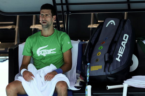 Serbian tennis player Novak Djokovic rests at Melbourne Park as questions remain over the legal battle regarding his visa to play in the Australian Open