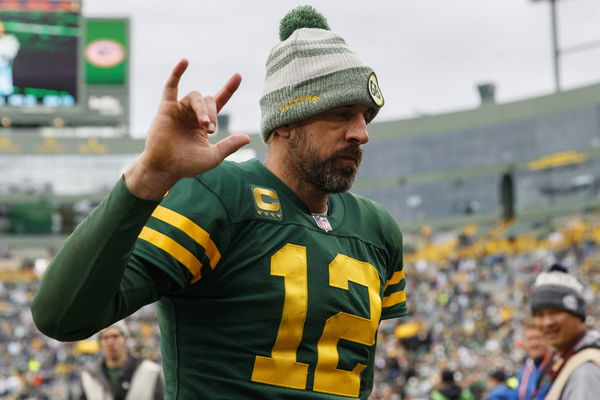 GREEN BAY, WI - OCTOBER 16: Green Bay Packers quarterback Aaron Rodgers  (12) passes during a game between the Green Bay Packers and the New York  Jets at Lambeau Field on October