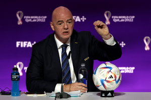 FIFA President Gianni Infantino with a soccer ball