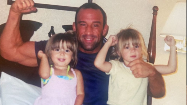 Mark Coleman with his daughters