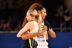Chicago Sky forward Angel Reese (5) and Dallas Wings guard Paige Bueckers (5)
