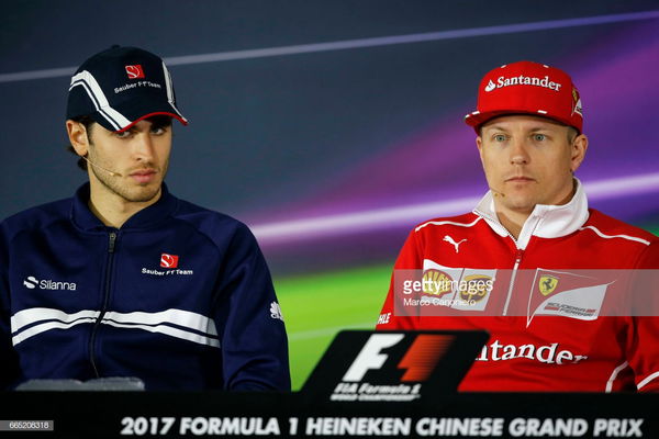 Antonio Giovinazzi of Sauber and Kimi Raikkonen of Ferrari